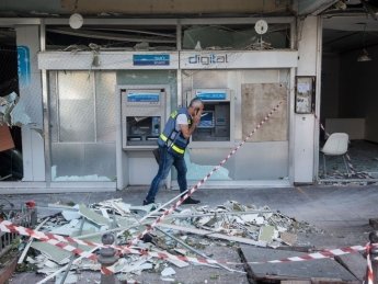 Последствия обстрела из Газы в израильском Холоне 12 мая. Фото: GettyImages