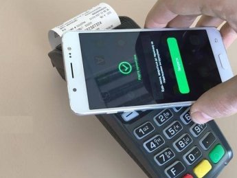 Терминал в смартфоне: Райффайзен Банк и Visa запускают программу по приему платежей
