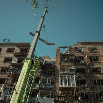поврежденный дом после обстрела РФ