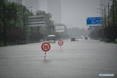 Фото 7 — Наводнение в Китае: 12 человек погибли в затопленном метро Чжэнчжоу (ФОТО, ВИДЕО)