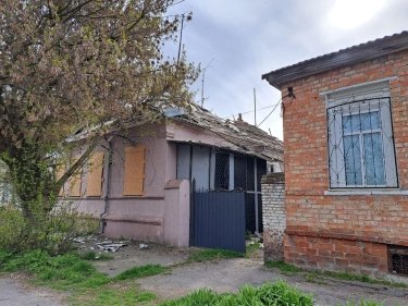 Фото 3 — Оккупанты обстреляли несколько зданий в Никополе: один человек получил ранения