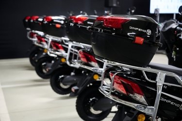 Фото 4 — Япония и ПРООН передали Минсоцполитики 200 электроскутеров для соцработников