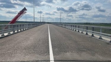 Фото 3 — На Варшавській трасі відкрили рух відновленим мостом у Бородянці (ФОТО)