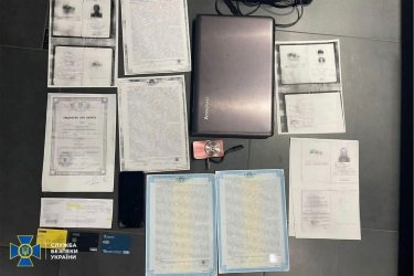 Фото 5 — СБУ задержала в Харькове банду "черных риелторов", которой помогал полицейский: все подробности (ФОТО, ВИДЕО)