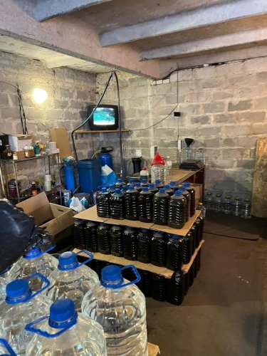 Фото 14 — В Киевской области нашли подпольное производство спирта: сбывали оптом "своим" людям (ФОТО)