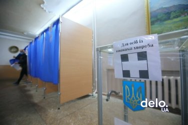 Фото 29 — День выборов: как Украина голосует во время пандемии (ФОТОРЕПОРТАЖ)