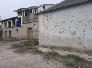 Фото 4 — Оккупанты обстреляли несколько зданий в Никополе: один человек получил ранения