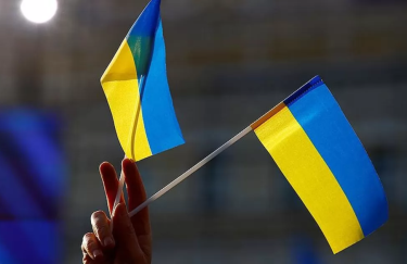 українці