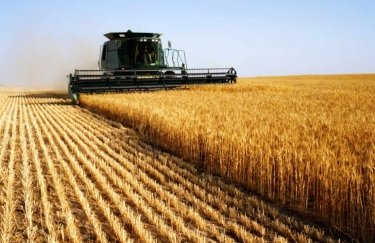 Аграрії збирають врожай пшениці. Фото: Depositphotos