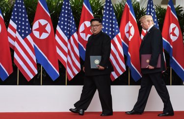 Ким Чен Ын и Дональд Трамп (Фото: Anthony Wallace/Reuters)